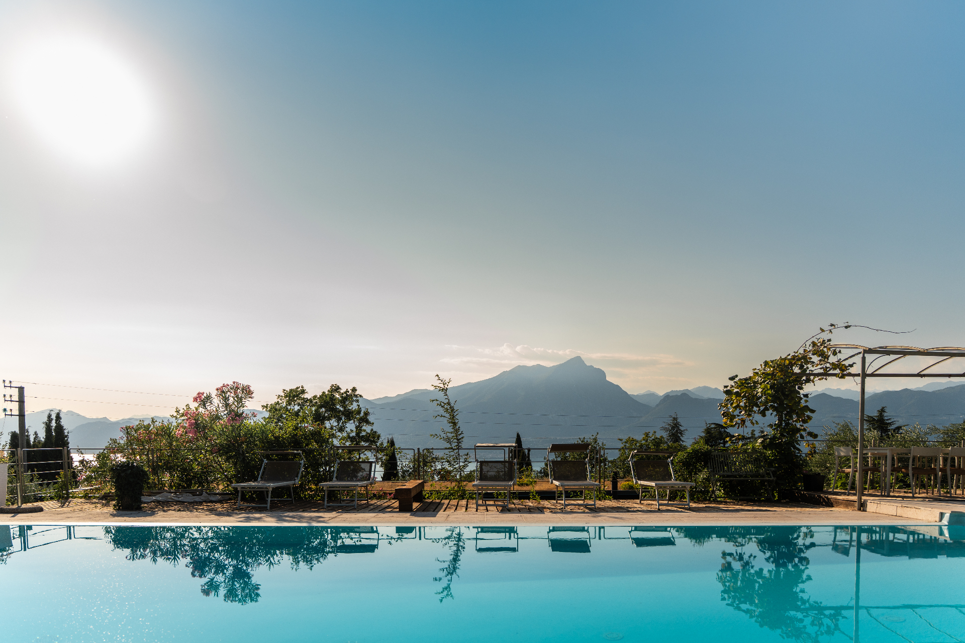 Pool at sunrise with mountain views